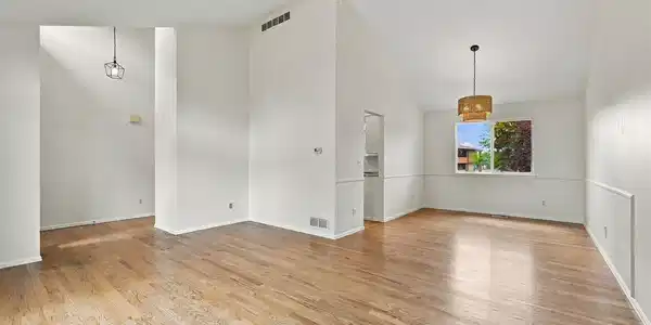 Image 4: Living Room looking to dining room.