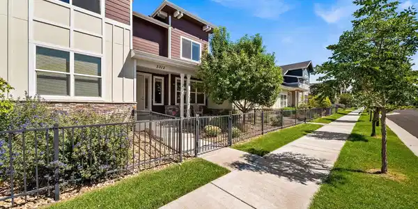 Image 4: Inviting front elevation showcases quality Trailhead Homes craftsmanship and stone accents along the HOA-maintained greenbelt walkway. Image 4: Inviting front elevation showcases quality Trailhead Homes craftsmanship and stone accents along the HOA-maintained greenbelt walkway.