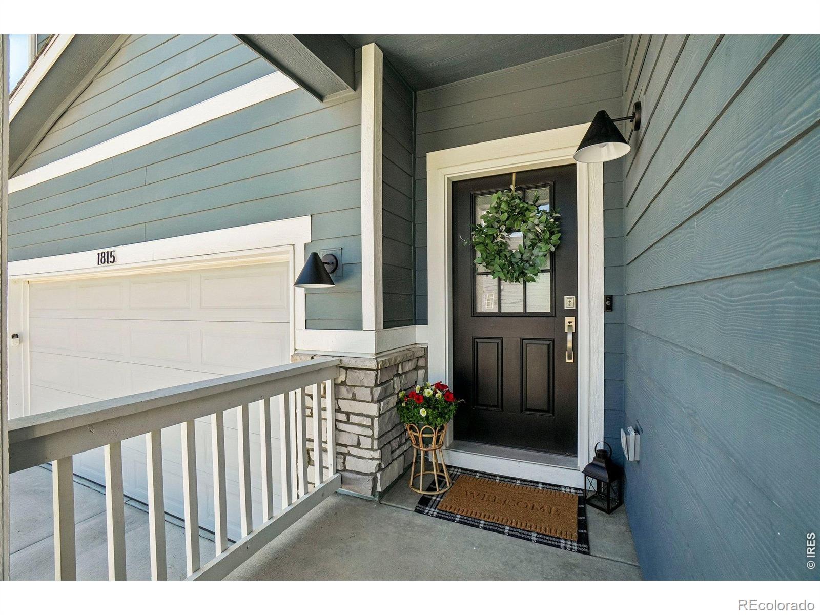 Image 4: The covered front entry shields you from the elements and adds a warm and welcoming touch
