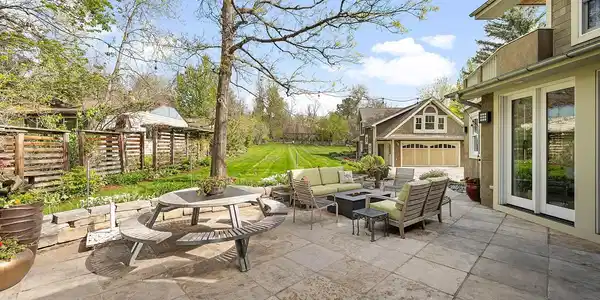 Image 3: Large buff stone patio opens to expansive back yard Image 3: Large buff stone patio opens to expansive back yard