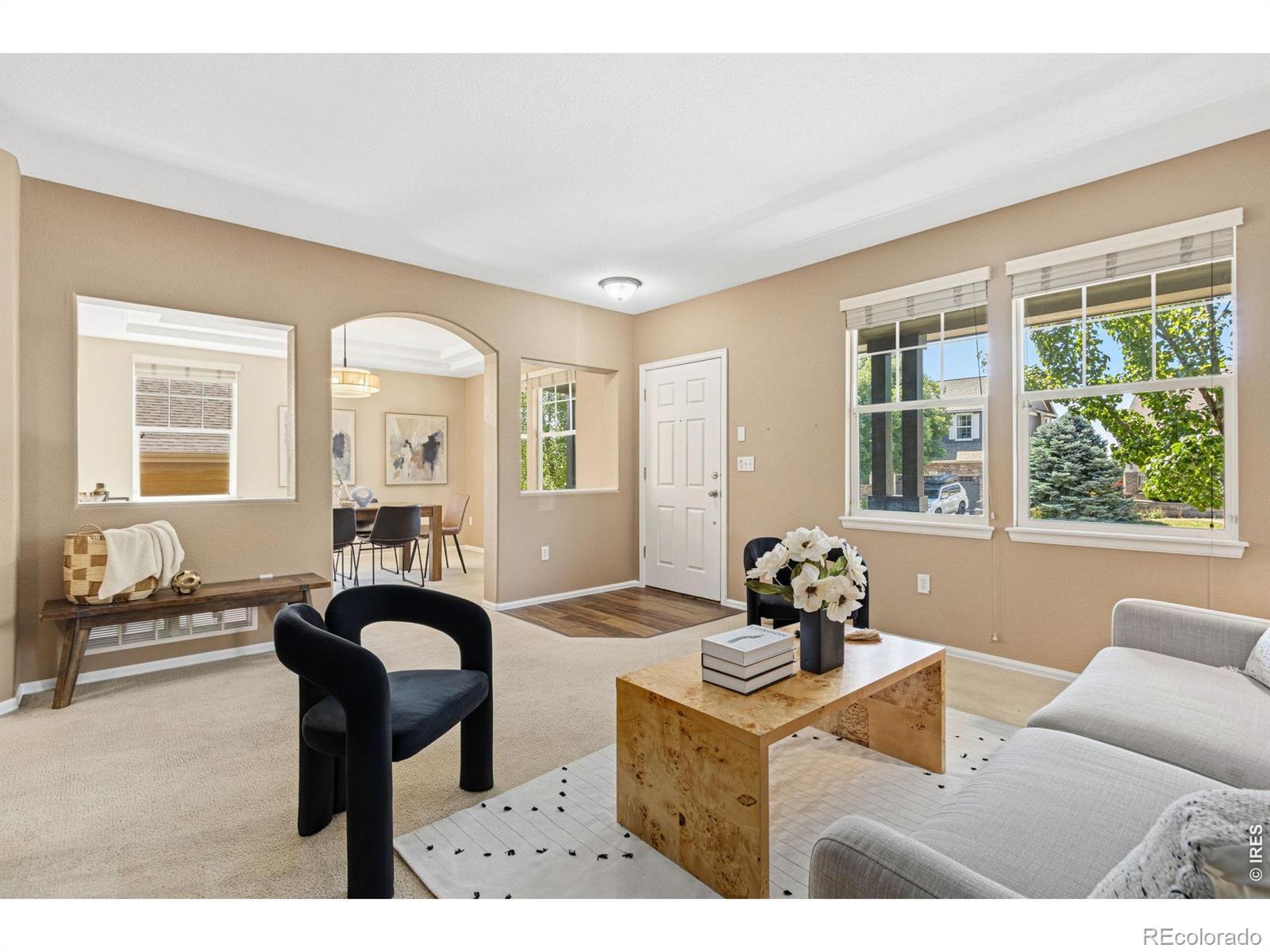 Image 4: Enter the home into the front living room, adjacent to the formal dining room.