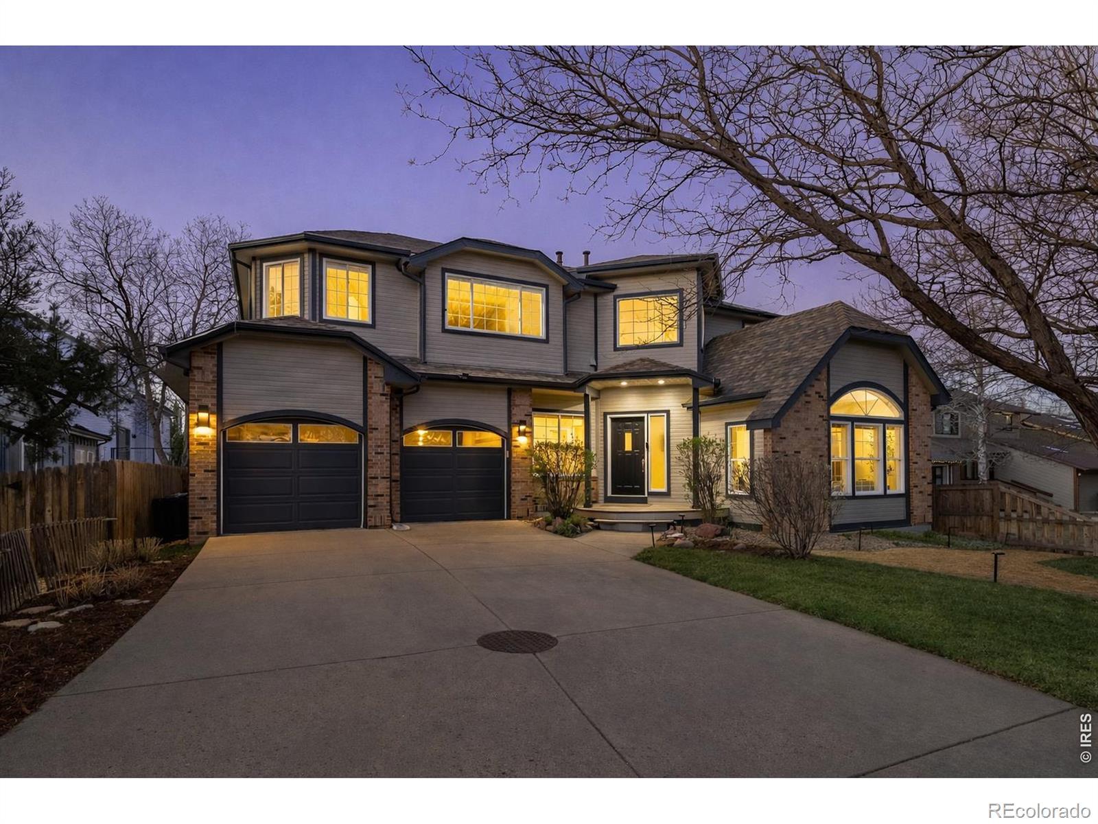 Image 2: An exquisite North Boulder home backing to Wonder Lake and the sweeping foothills (Image enhanced with Ai to show greener grass) Image 2: An exquisite North Boulder home backing to Wonder Lake and the sweeping foothills (Image enhanced with Ai to show greener grass)