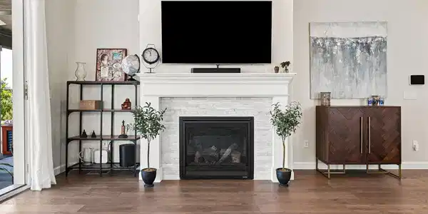 Image 2: Warm and welcoming fireplace in the living room