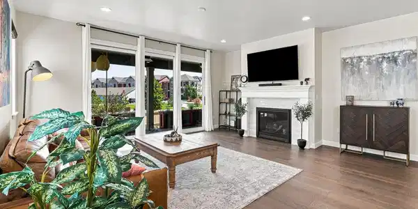 Image 3: The entire main floor has hardwood floors.