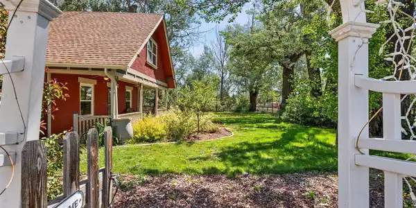 Image 3: Cottage style entry, with numerous fruit trees across the property. Image 3: Cottage style entry, with numerous fruit trees across the property.