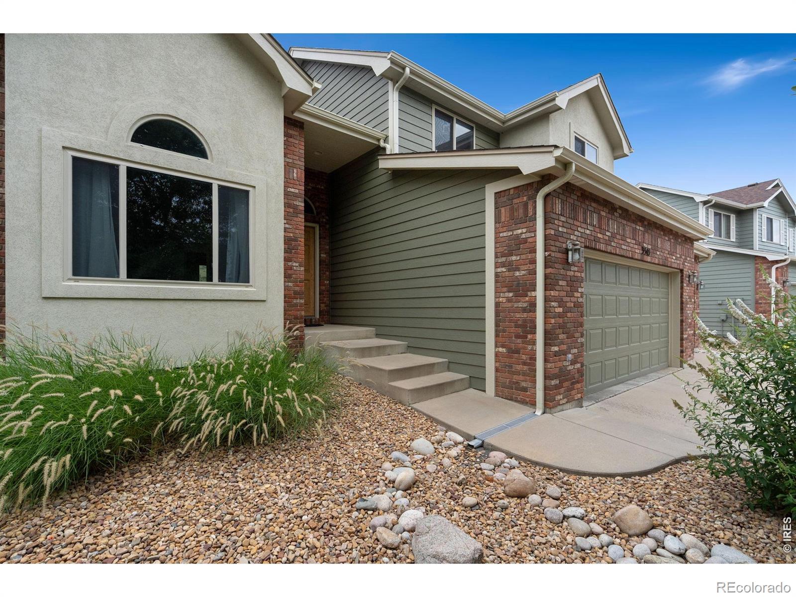 Image 2: The roof was just replaced with Class 4 shingles, and youll appreciate the newer exterior paint, patio door, garage doors, and garage door openers.