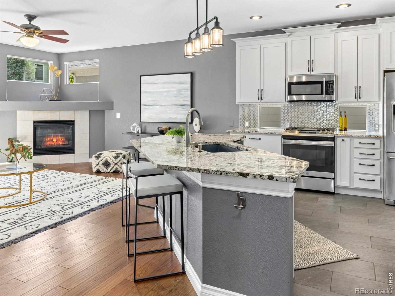 Image 2: The open-concept layout creates a seamless transition between the gourmet kitchen and the inviting living area, making it perfect for both daily living and entertaining. The fluid floor plan ensures that the chef stays connected Image 2: The open-concept layout creates a seamless transition between the gourmet kitchen and the inviting living area, making it perfect for both daily living and entertaining. The fluid floor plan ensures that the chef stays connected