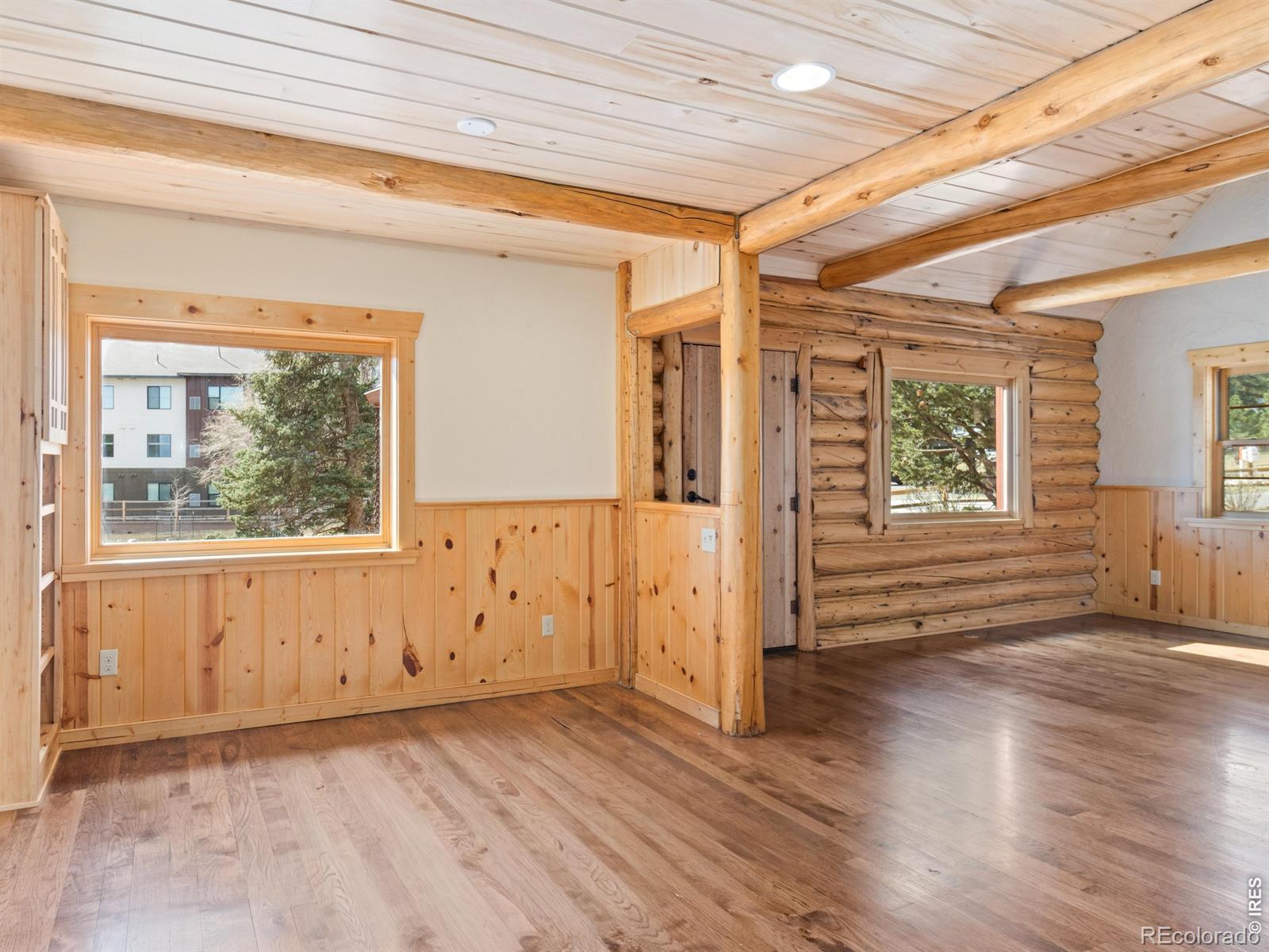 Image 3: Dining room and front entry into family room