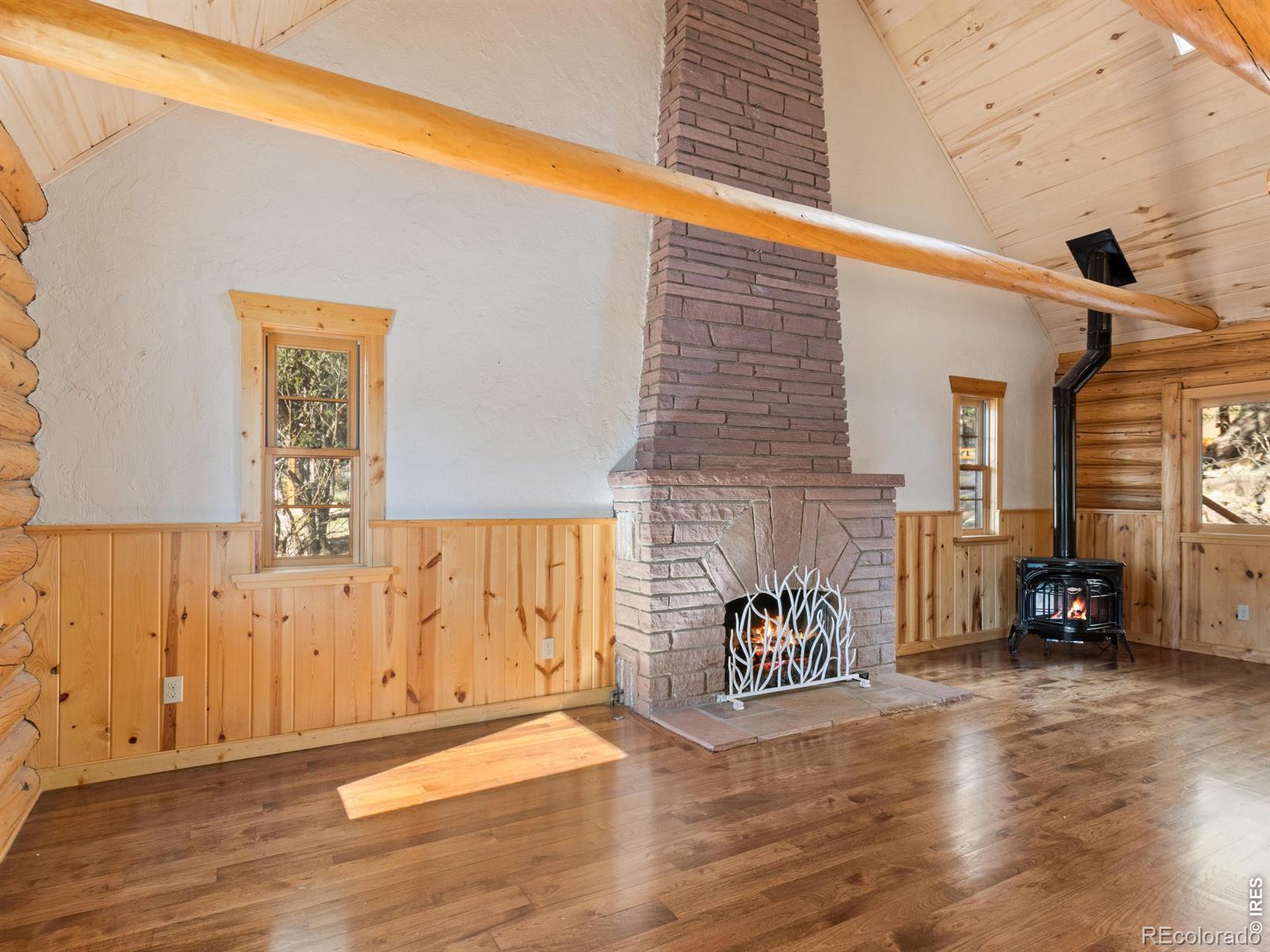 Image 4: family room with gas fireplace x 2!