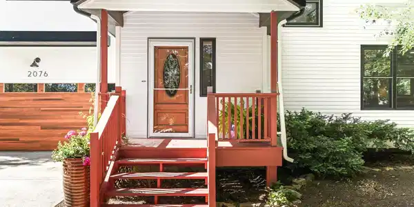 Image 2: The front door has a small covered porch. Image 2: The front door has a small covered porch.