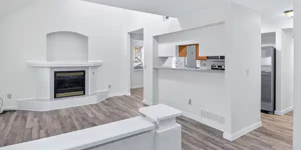 Image 4: Living Room w/ gas fireplace and updated flooring Image 4: Living Room w/ gas fireplace and updated flooring