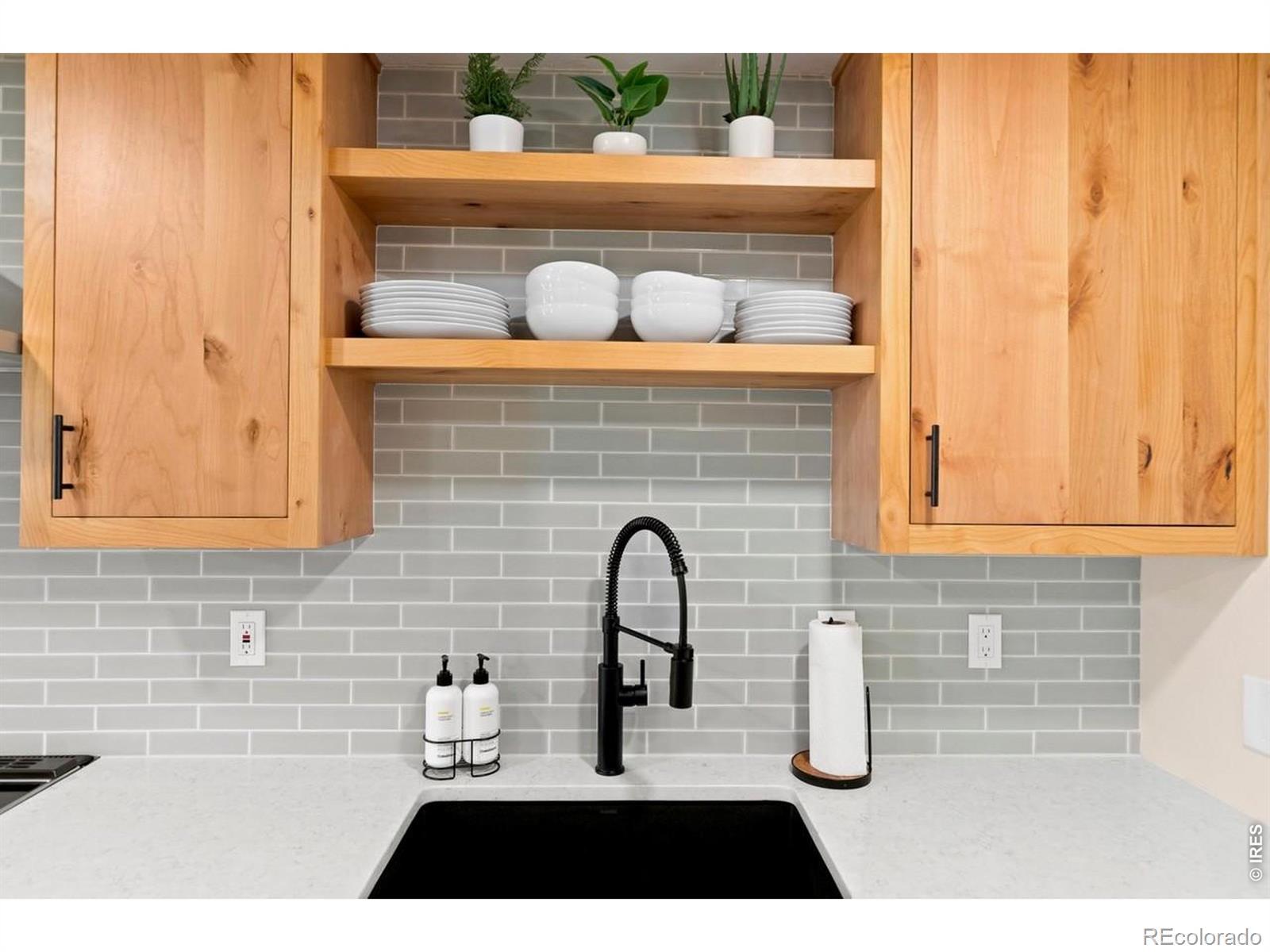Image 3: Beautiful Fireclay Tile backsplash & Bianco Silgranit sink. Image 3: Beautiful Fireclay Tile backsplash & Bianco Silgranit sink.