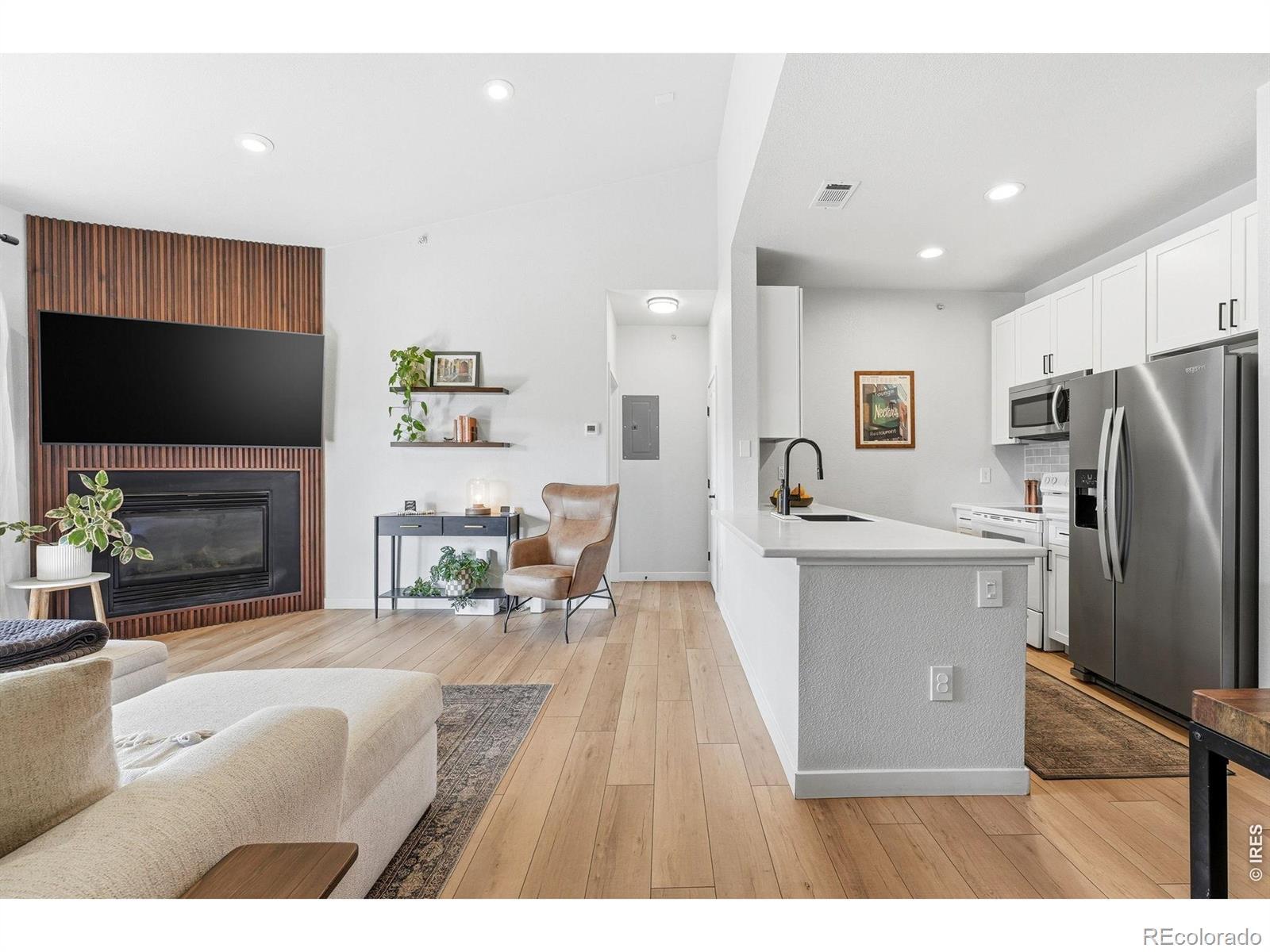 Image 2: This fully updated and modern home has soaring ceilings that fill the space with light. Image 2: This fully updated and modern home has soaring ceilings that fill the space with light.