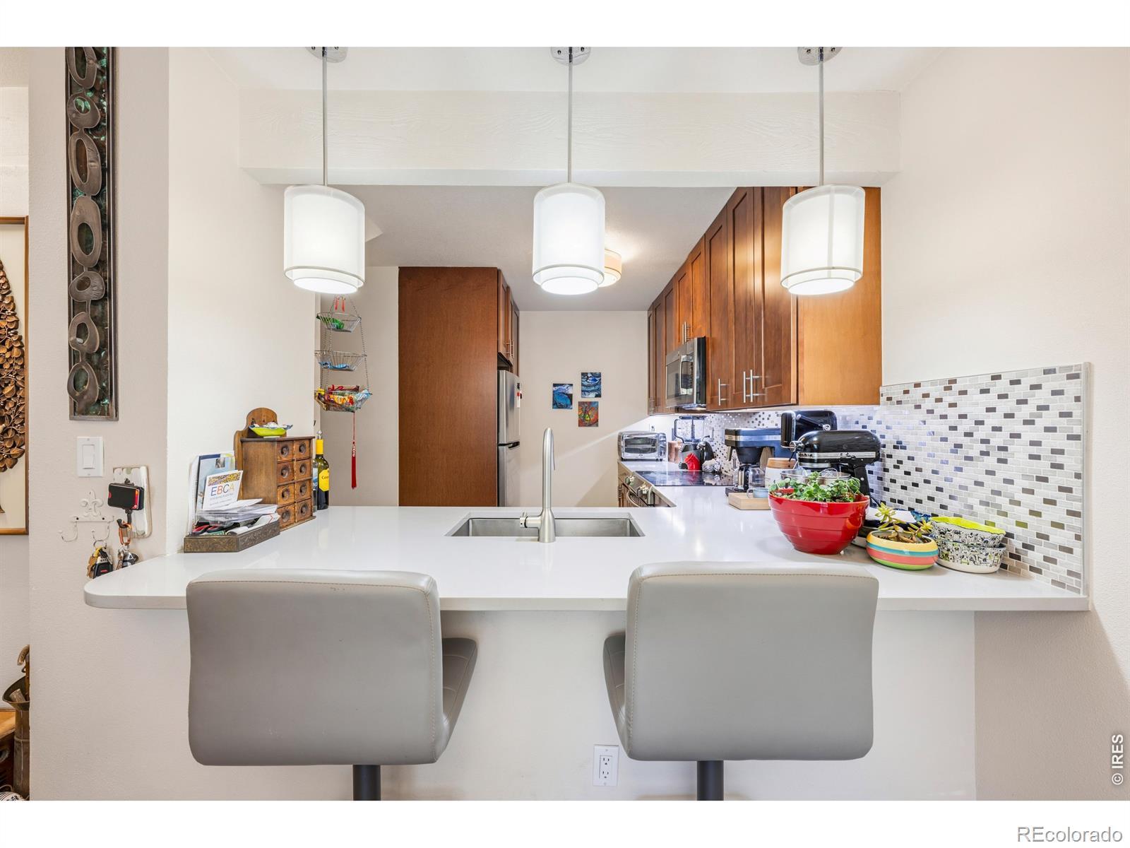 Image 4: Updated kitchen, custom tile backsplash, cherry cabinets, stainless steel appliances. Image 4: Updated kitchen, custom tile backsplash, cherry cabinets, stainless steel appliances.