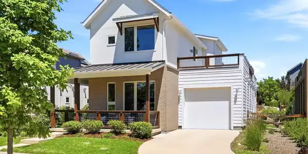 Image 4: Driveway leading to 2-car tandem attached garage.
