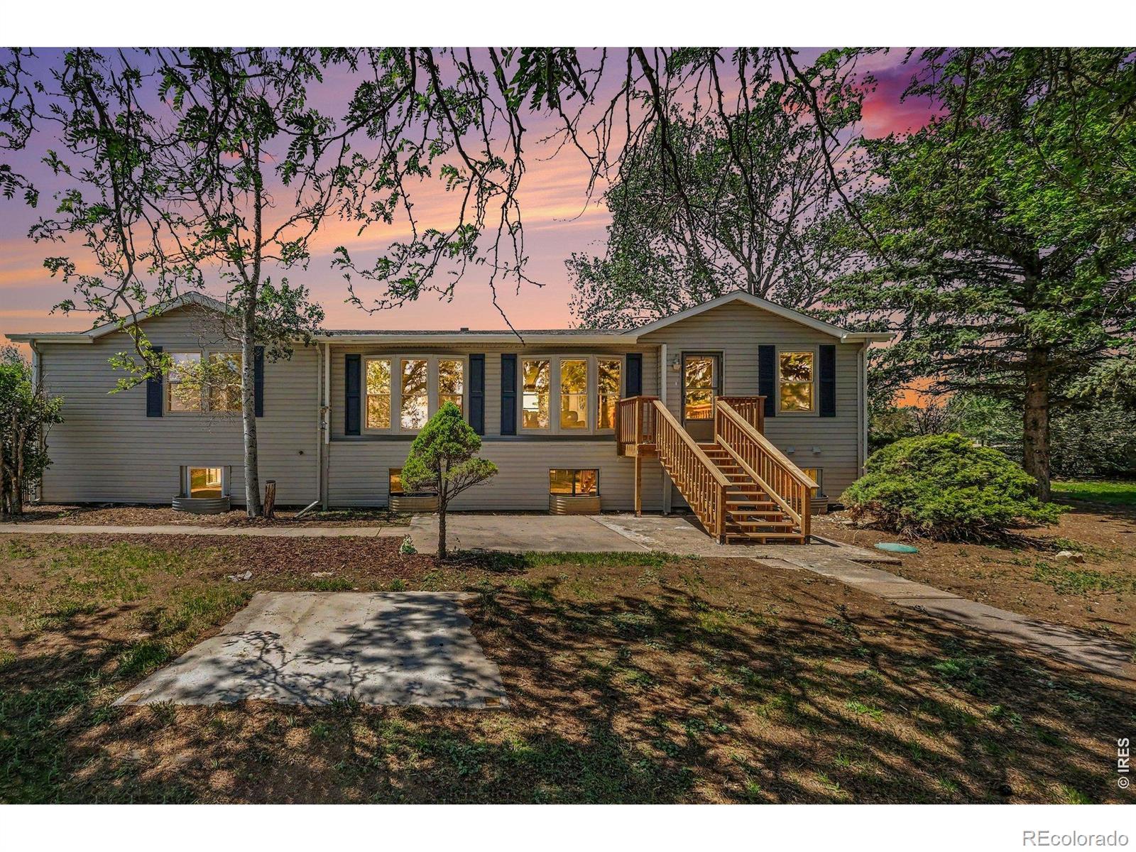 Image 1: 7170 Lamar is a raised ranch that has over 3600 finished sf and sits 15 min north of Fort Collins on .87 acre! Image 1: 7170 Lamar is a raised ranch that has over 3600 finished sf and sits 15 min north of Fort Collins on .87 acre!