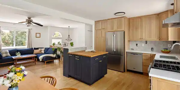 Image 4: Open floor plan and hardwood floors.