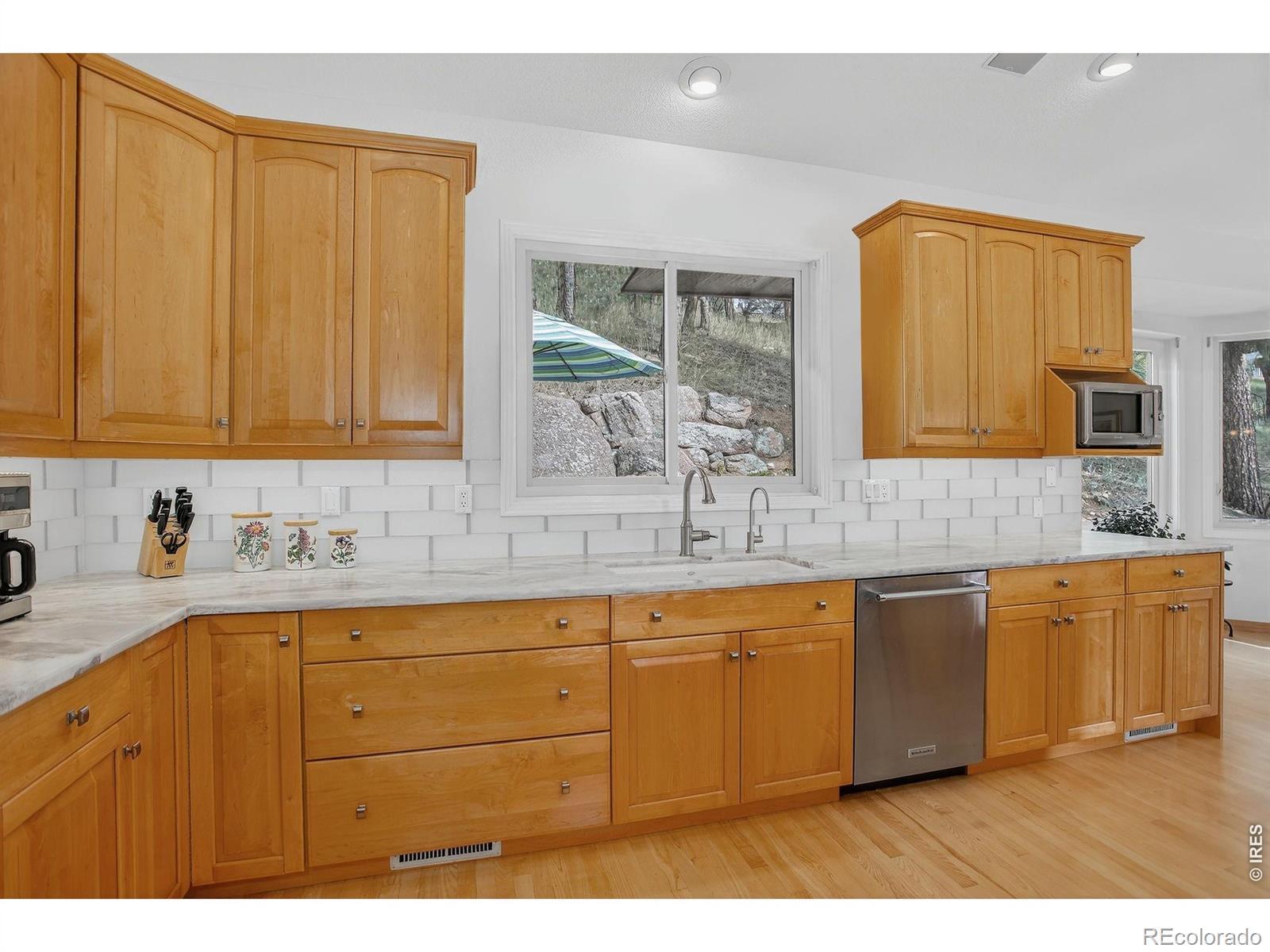 Image 4: Beautiful updated natural stone countertops add a touch of timeless elegance Image 4: Beautiful updated natural stone countertops add a touch of timeless elegance