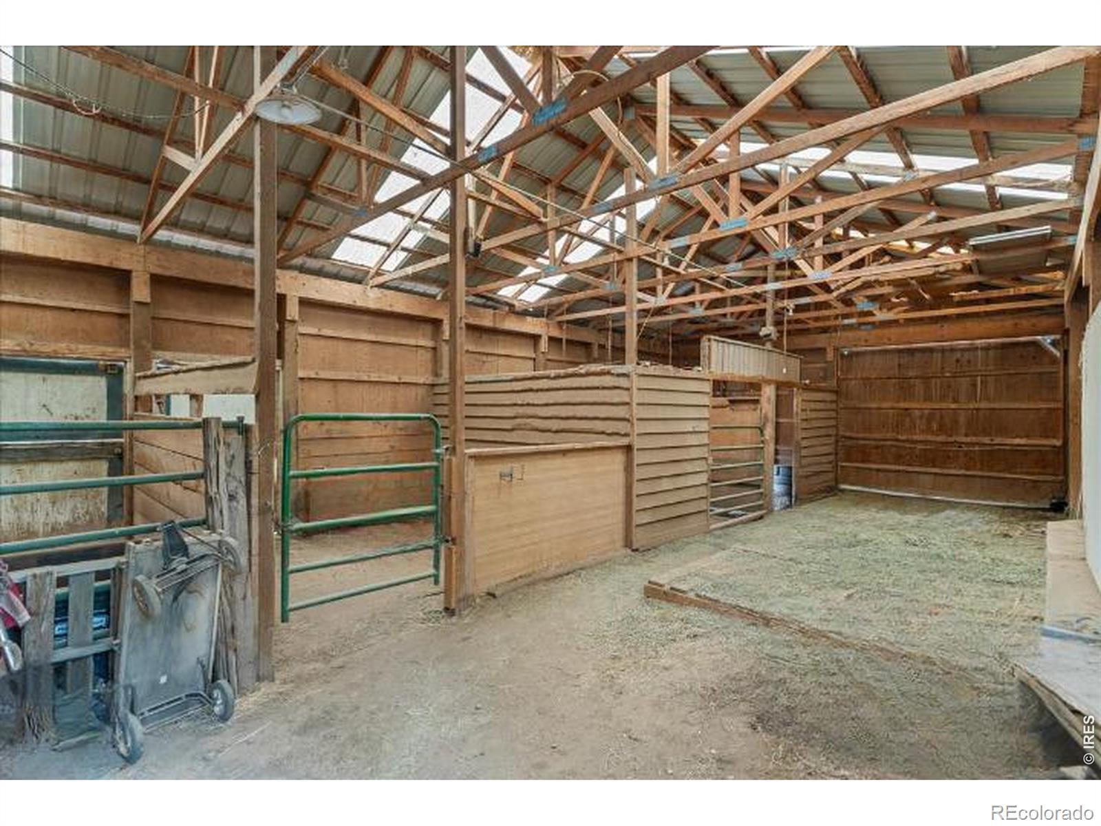 Image 4: 4-Stall Barn with Hay Storage, Electrical and access to connected future corral area. Image 4: 4-Stall Barn with Hay Storage, Electrical and access to connected future corral area.