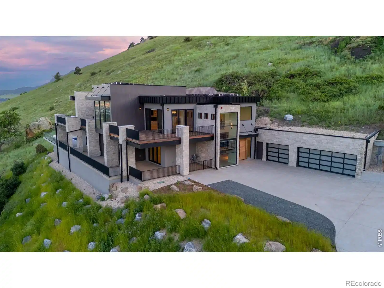 Image 1: Perched above Boulder in the coveted Pine Brook Hills enclave, this private, resort-style retreat redefines elevated mountain living-where luxury, wellness, and breathtaking natural beauty converge just minutes from downtown. Image 1: Perched above Boulder in the coveted Pine Brook Hills enclave, this private, resort-style retreat redefines elevated mountain living-where luxury, wellness, and breathtaking natural beauty converge just minutes from downtown.
