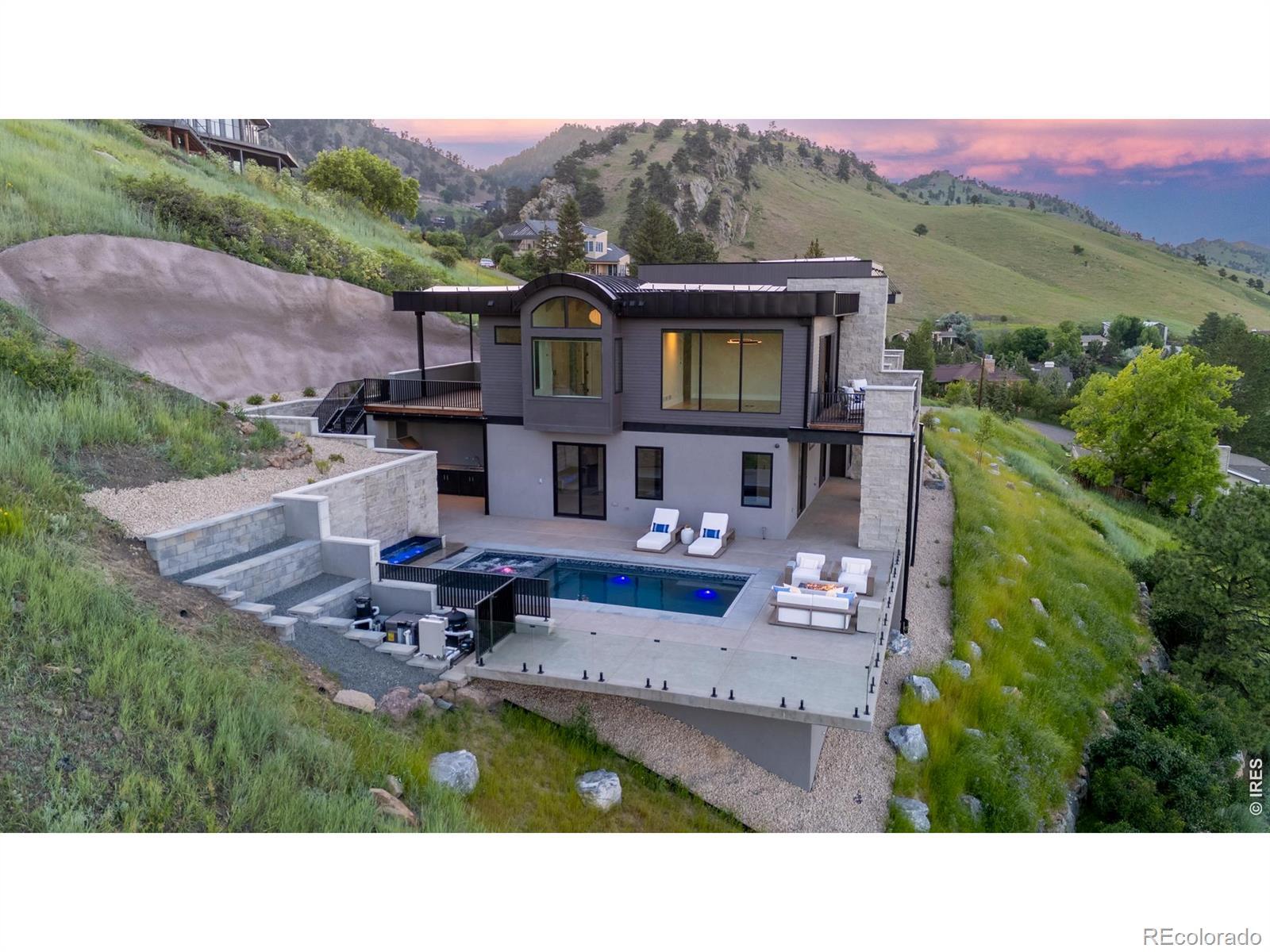 Image 2: Set against a backdrop of unimpeded, panoramic views of the city and foothills, every space is thoughtfully designed to capture light, scale, and scenery through soaring ceilings and dramatic walls of glass. Image 2: Set against a backdrop of unimpeded, panoramic views of the city and foothills, every space is thoughtfully designed to capture light, scale, and scenery through soaring ceilings and dramatic walls of glass.