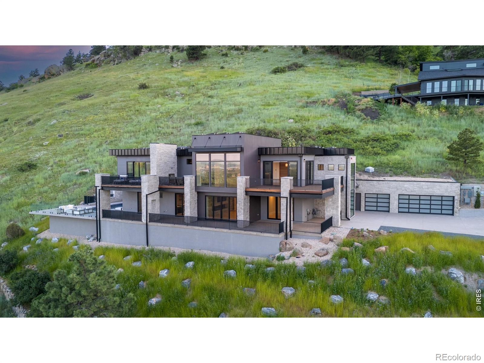 Image 3: An extraordinary new construction residence overlooking the sweeping beauty of Boulder, this home offers 5,622 SF of impeccably designed living space. Image 3: An extraordinary new construction residence overlooking the sweeping beauty of Boulder, this home offers 5,622 SF of impeccably designed living space.