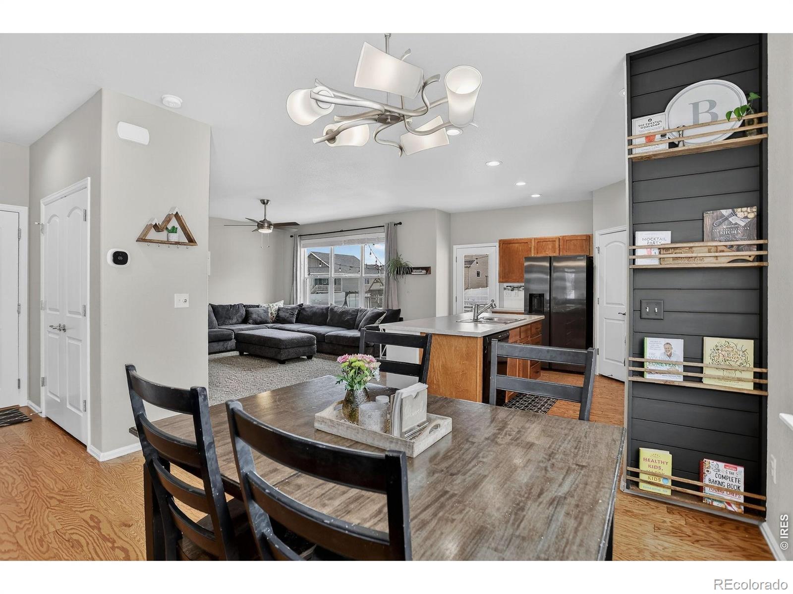 Image 3: Dining Room to Kitchen and Living Room