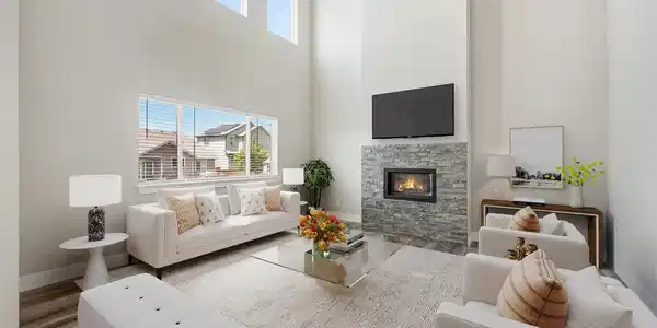 Image 4: Warm  Living Room with Fireplace