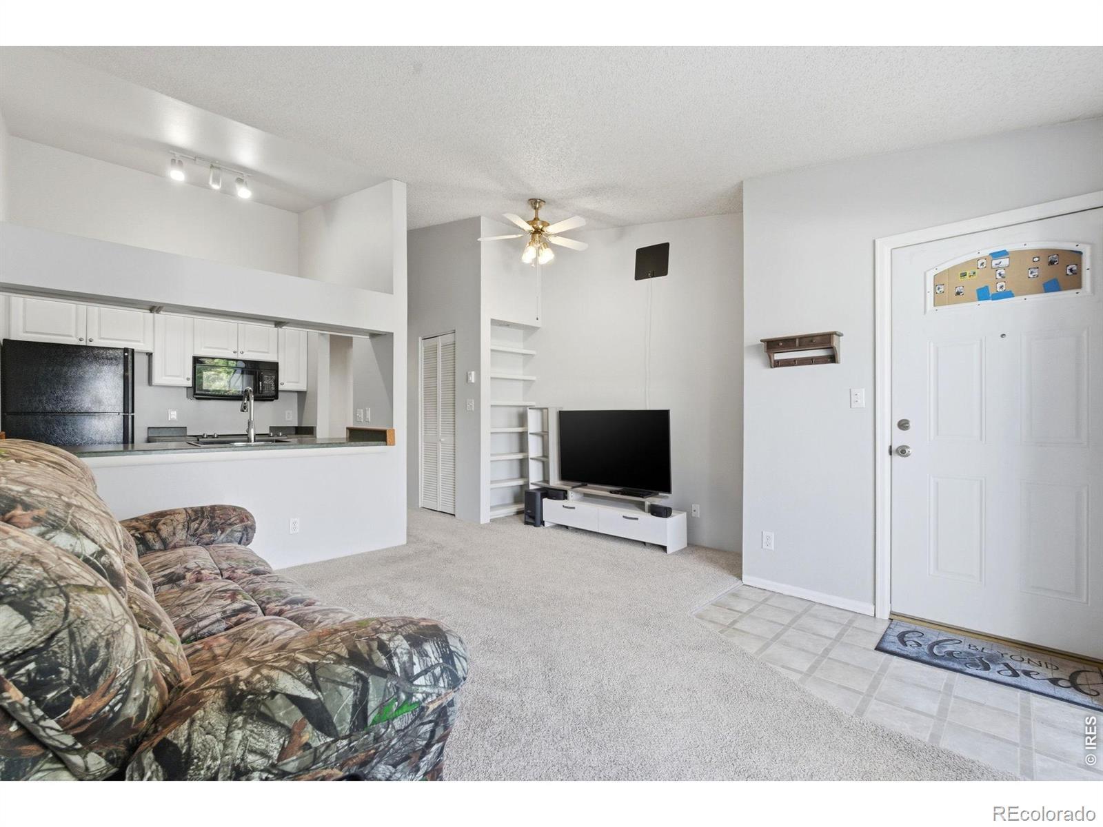 Image 2: Entry and Living Room