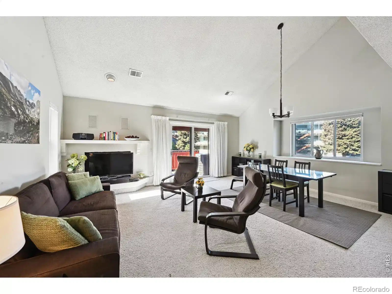 Image 1: Living Room with vaulted ceilings