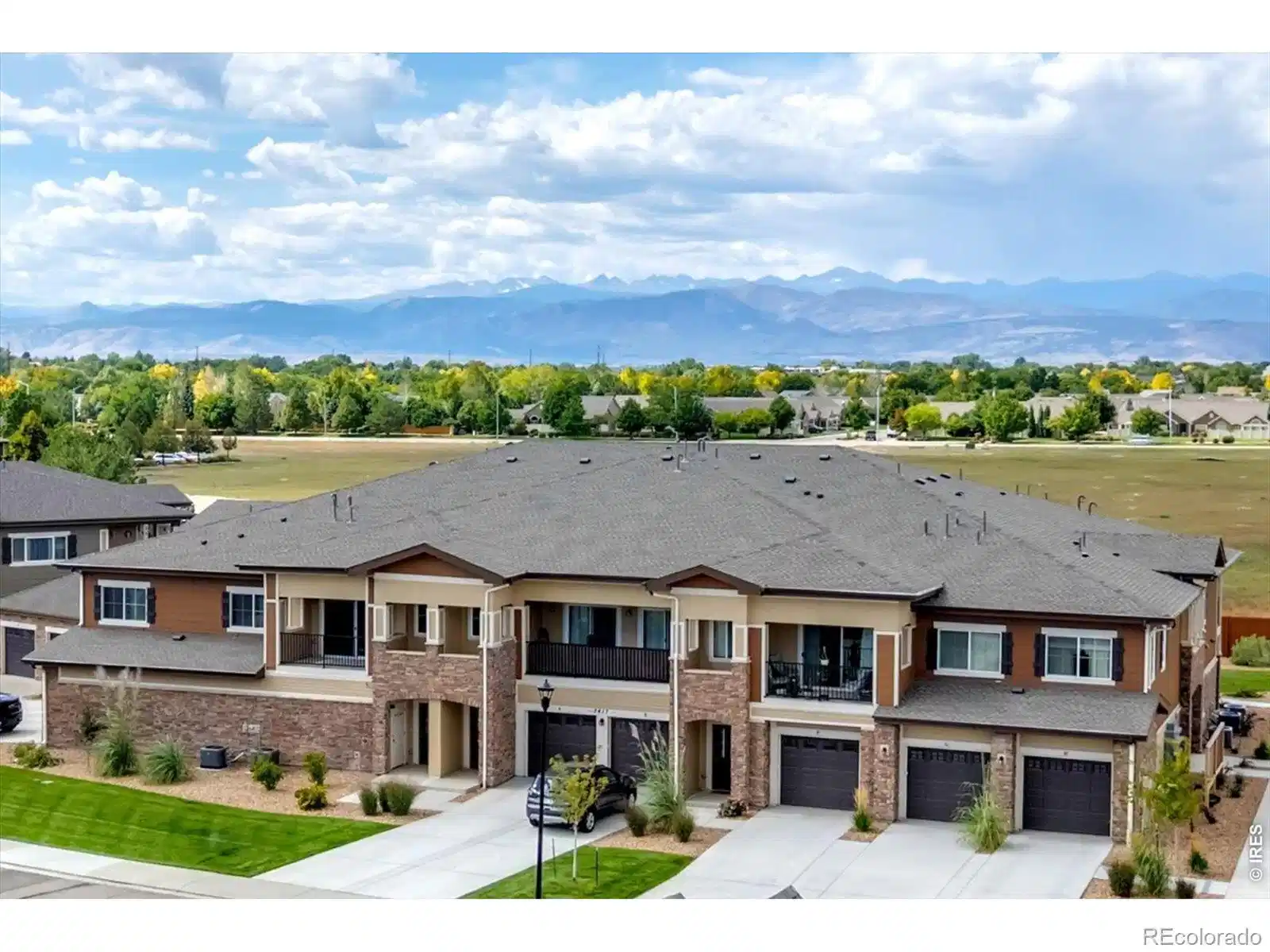 Image 1: Welcome home to Sonoma Villages newest condos with full Front Range Mountain Views from the back balcony patio! Image 1: Welcome home to Sonoma Villages newest condos with full Front Range Mountain Views from the back balcony patio!