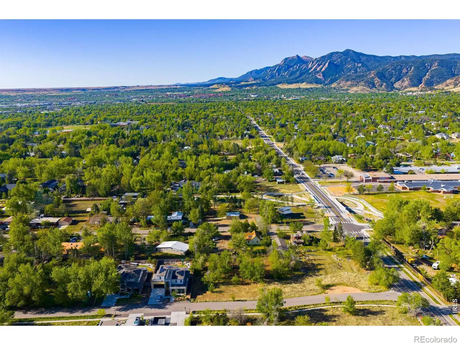 Image 1: Located in one of North Boulders most desirable neighborhoods, 1952 Vine Avenue offers a rare opportunity to build a custom residential property in a setting that fully captures the Boulder lifestyle.