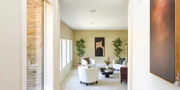 Image 4: the entry opens to a bright and spacious living room filled with natural light Image 4: the entry opens to a bright and spacious living room filled with natural light