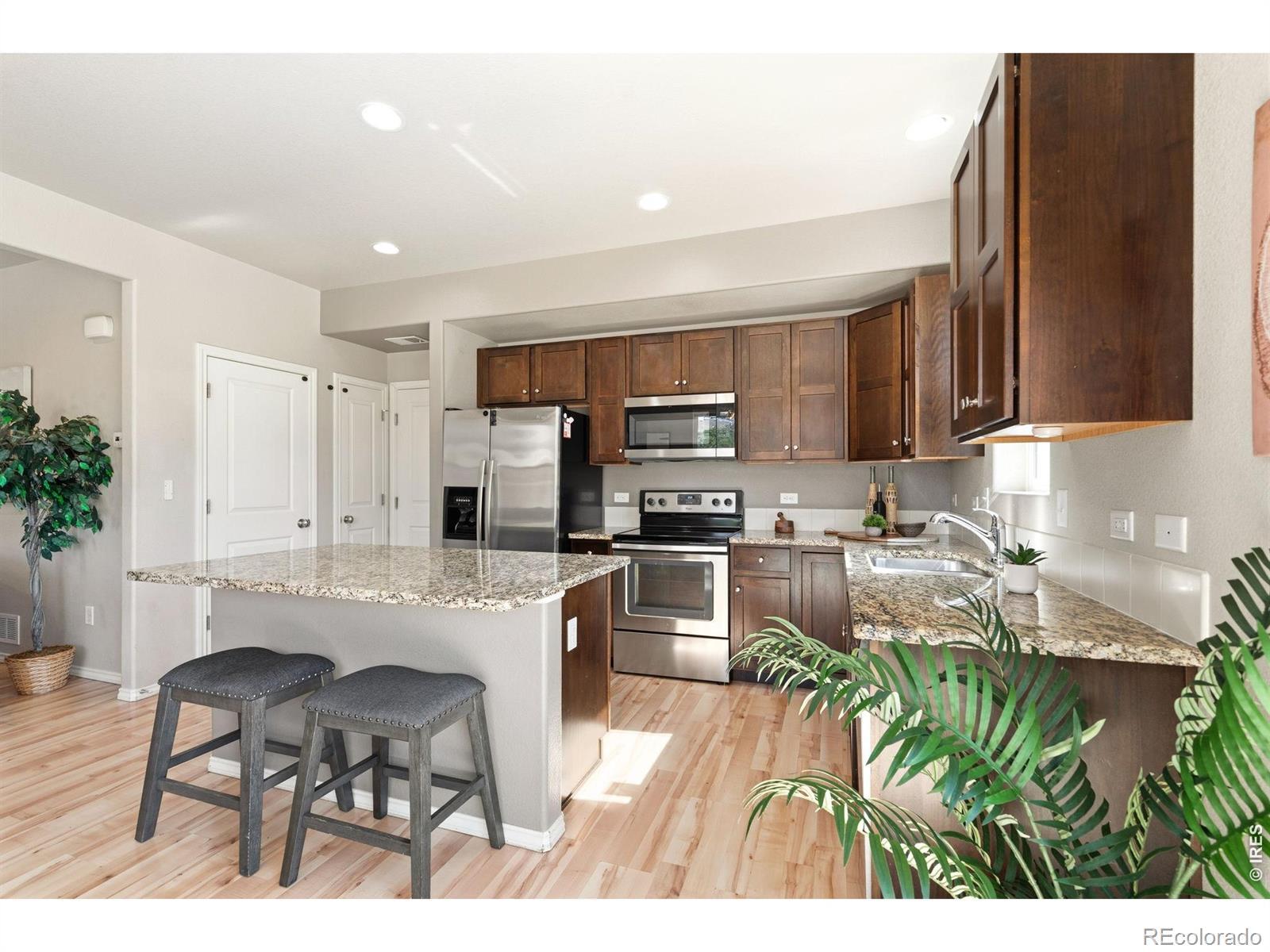 Image 2: Fully updated kitchen with large kitchen island for extra seating and prep space. Image 2: Fully updated kitchen with large kitchen island for extra seating and prep space.