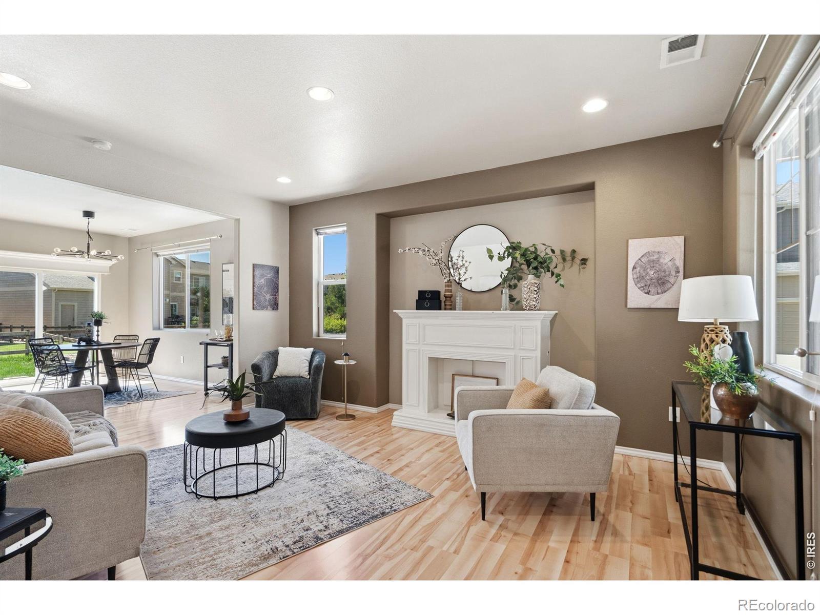 Image 3: Open-concept main level living, dining and kitchen. Image 3: Open-concept main level living, dining and kitchen.