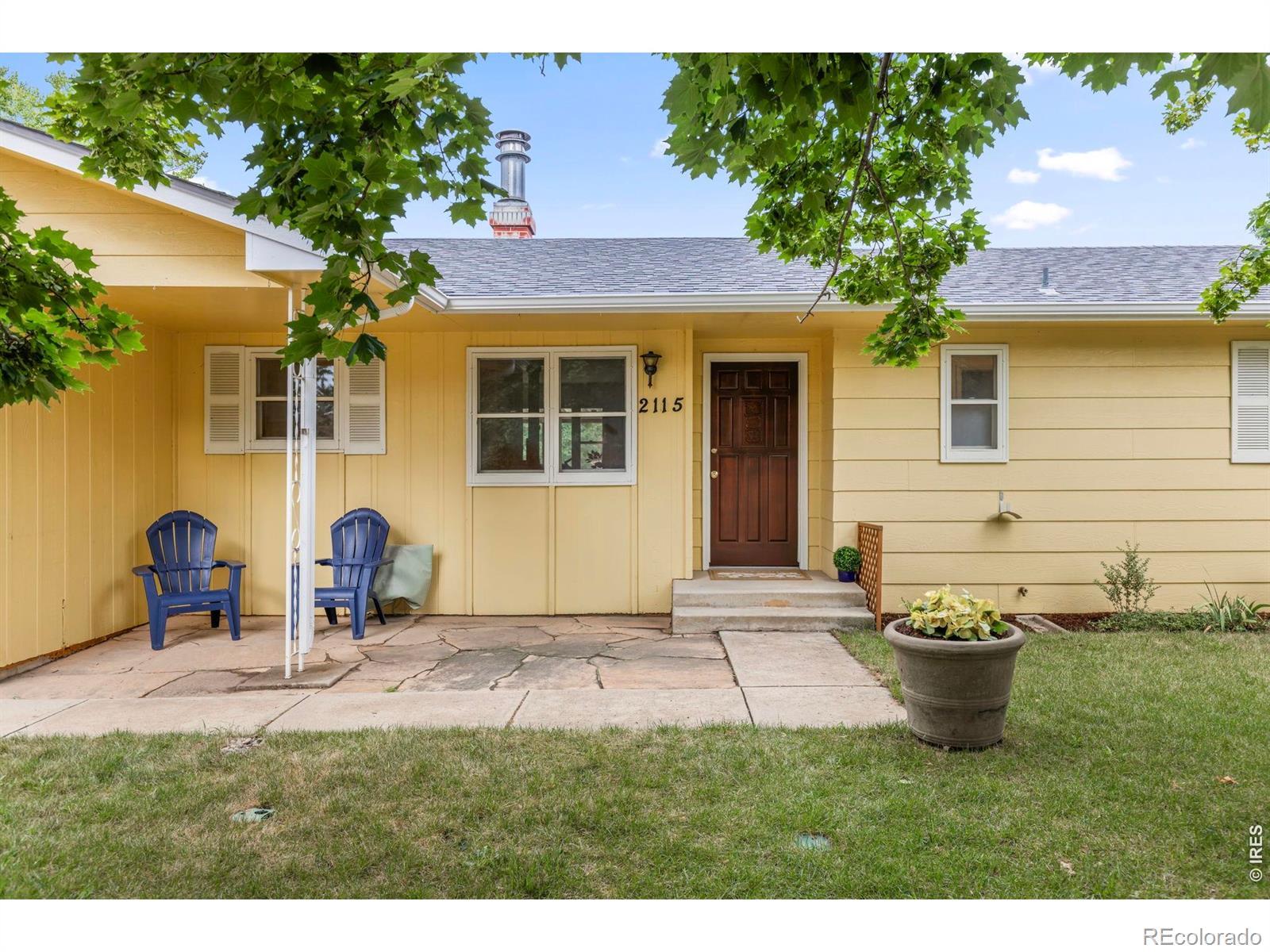 Image 2: Partially covered flagstone patio greets you and your guests