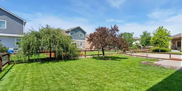 Image 4: Private fenced in backyard with mature trees. Image 4: Private fenced in backyard with mature trees.