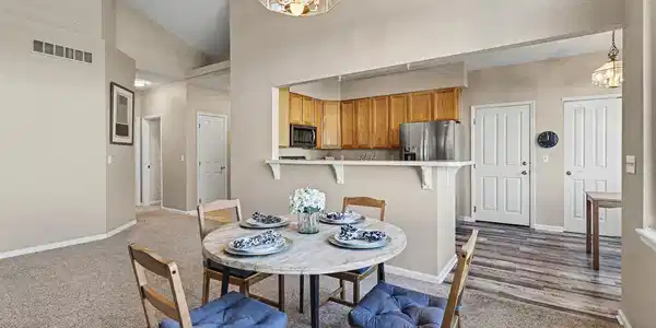 Image 4: Formal dining area that opens up to a spacious kitchen, perfect for entertaining guests. Image 4: Formal dining area that opens up to a spacious kitchen, perfect for entertaining guests.
