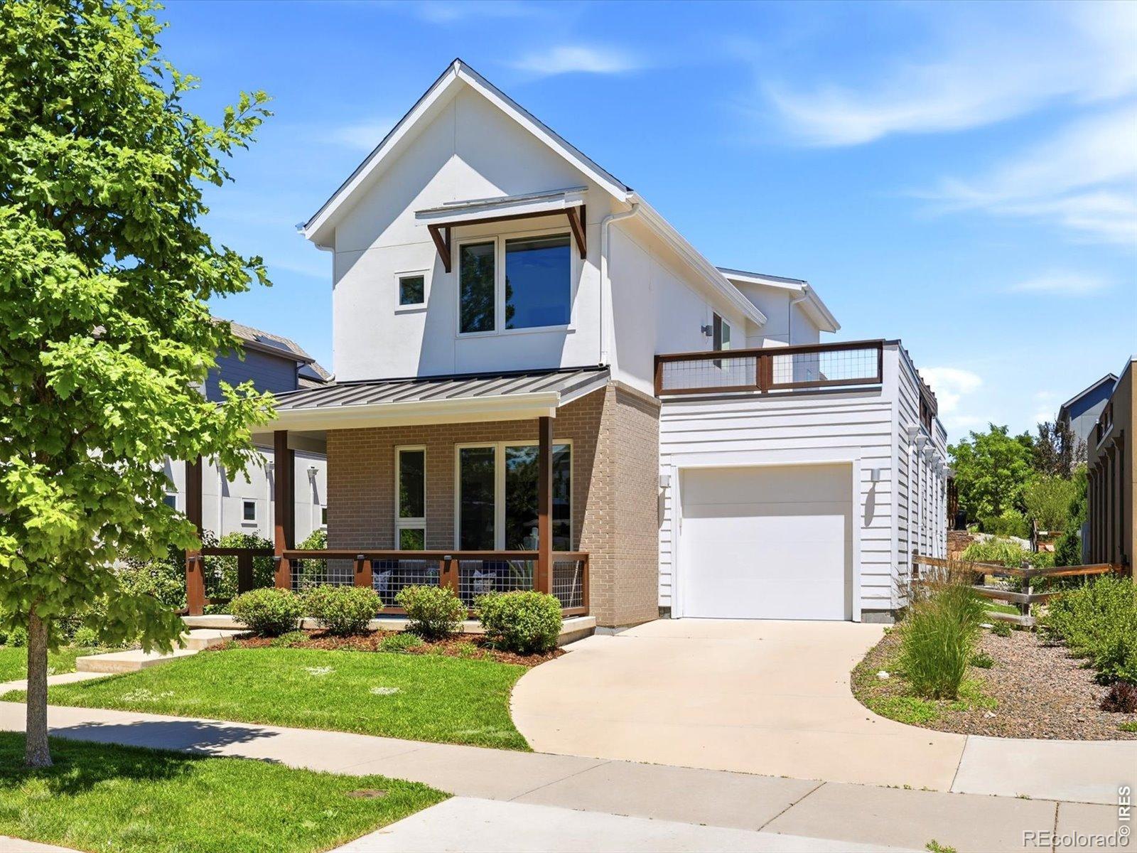 Image 3: Driveway leading to 2-car tandem attached garage.