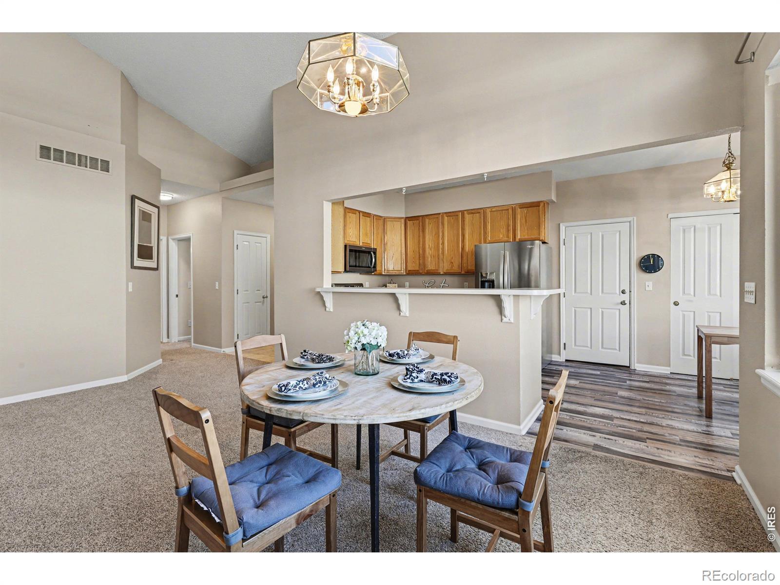 Image 4: Formal dining area that opens up to a spacious kitchen, perfect for entertaining guests. Image 4: Formal dining area that opens up to a spacious kitchen, perfect for entertaining guests.