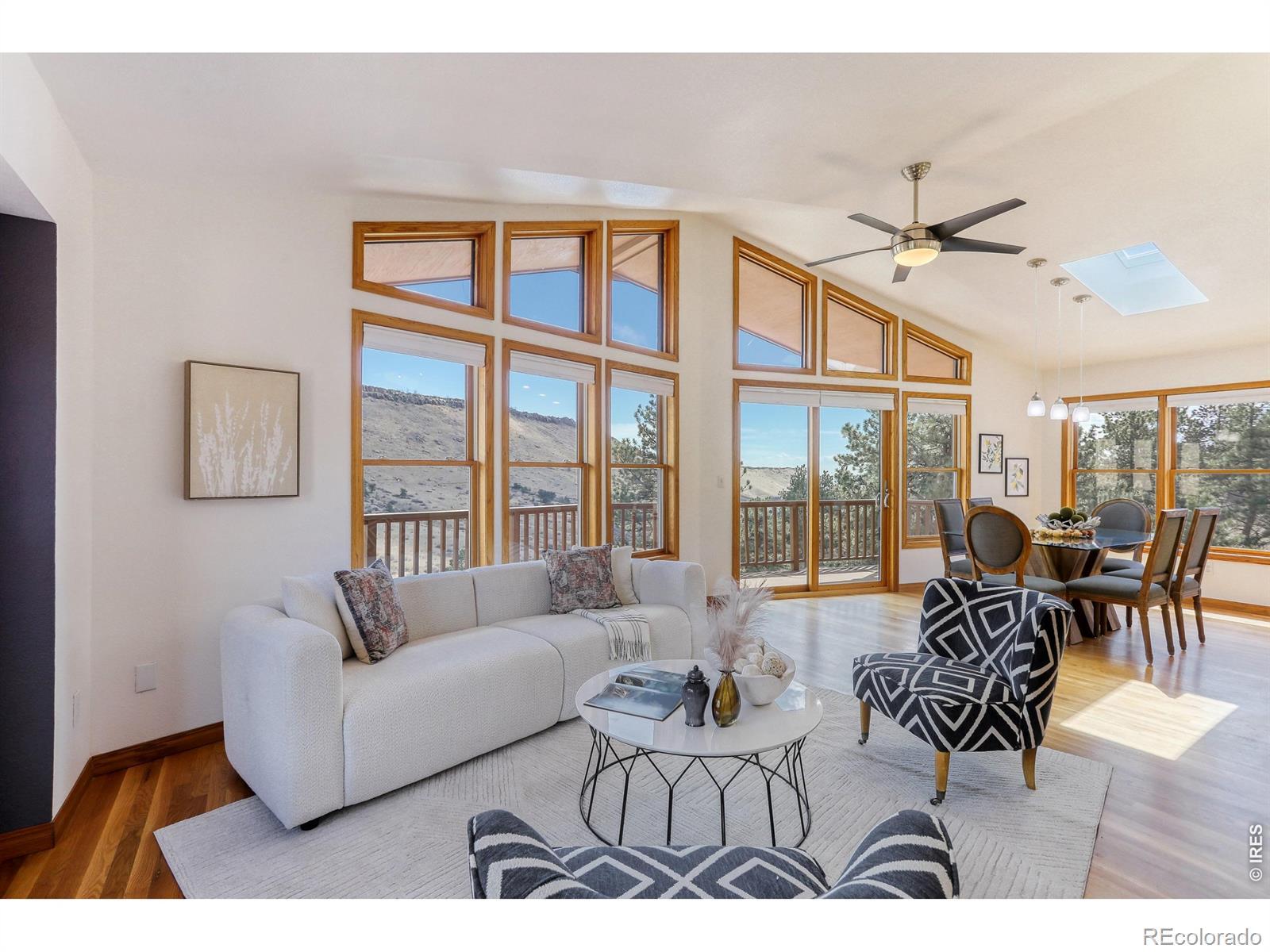 Image 4: Wall of windows frames foothill views Image 4: Wall of windows frames foothill views