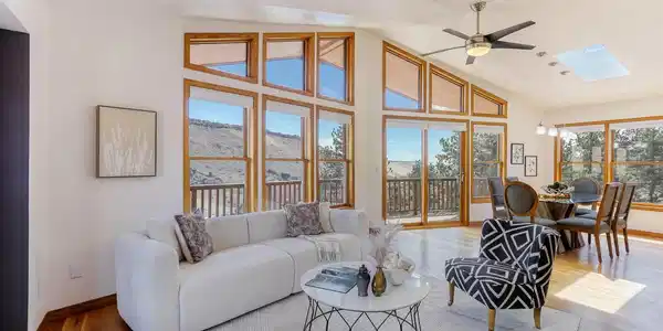 Image 4: Wall of windows frames foothill views Image 4: Wall of windows frames foothill views