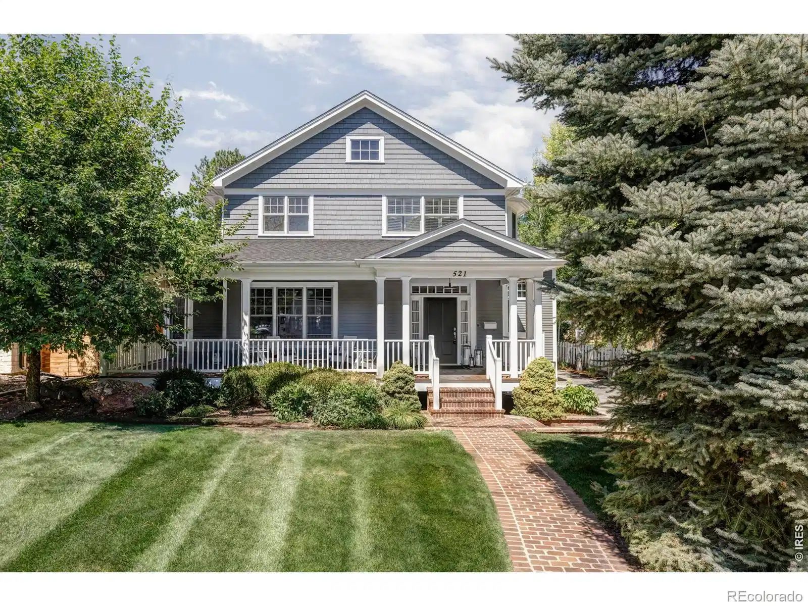 Image 1: 521 Hawthorn Avenue is a home with meaningful scale and genuine warmth, set on an oversized lot in one of Boulders most sought-after neighborhoods.