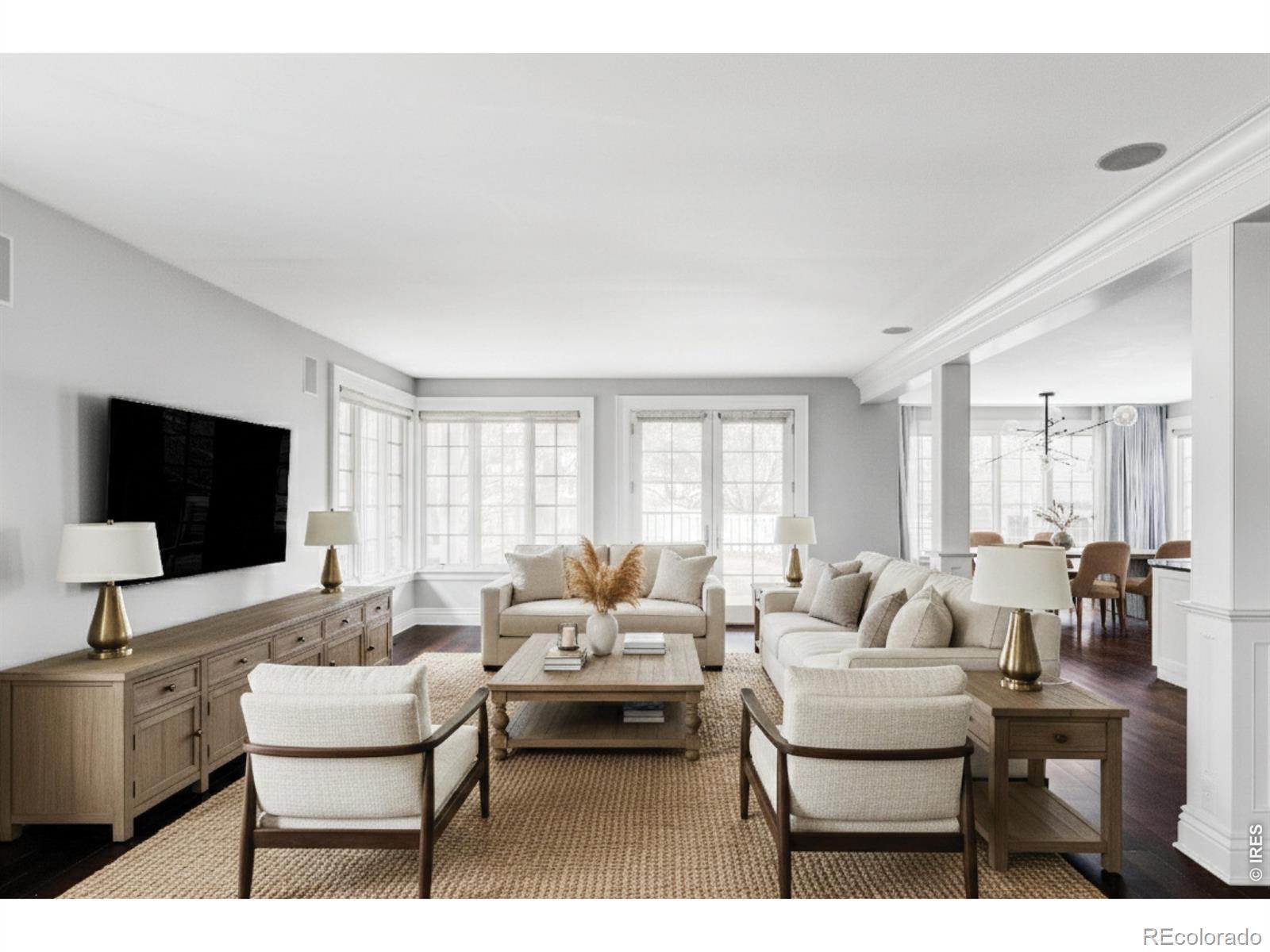 Image 3: Toward the back of the home, the family room flows into the kitchen, where an oversized island, premium appliances, and a sunny dining nook create the natural hub of daily life. (Photo is virtually staged) Image 3: Toward the back of the home, the family room flows into the kitchen, where an oversized island, premium appliances, and a sunny dining nook create the natural hub of daily life. (Photo is virtually staged)