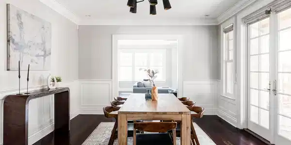 Image 4: The dining room comfortably accommodates long dinners and full tables without feeling oversized.