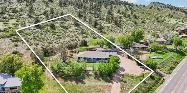 Image 2: Stunning 1.31-acre property with panoramic mountain views