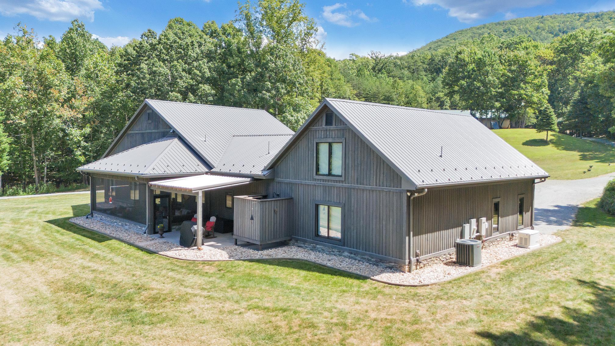 Image 3: Wood siding was just re-stained in 2025