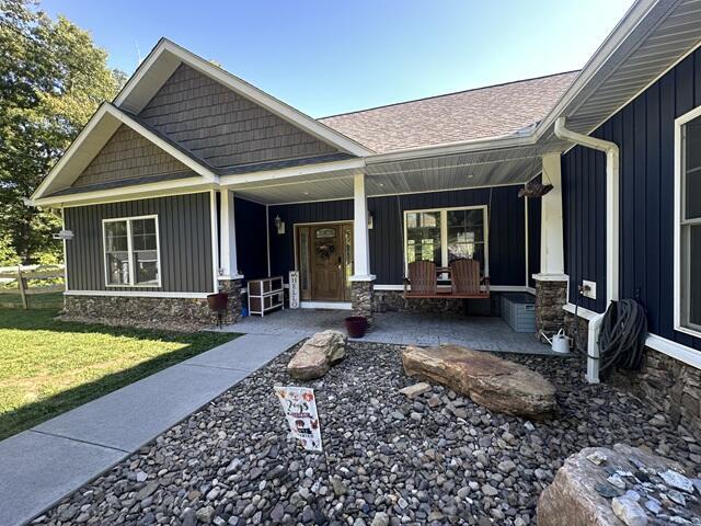 Image 4: brad front porch sidewalk