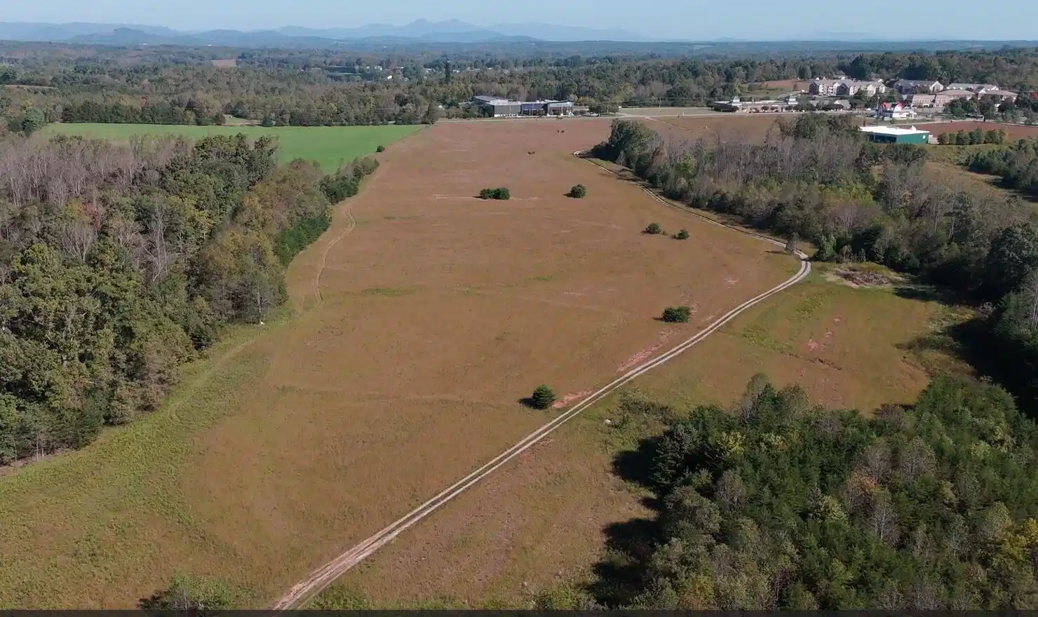 Image 1: 56 acres photo from rear of property
