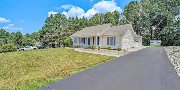 Image 2: Side w/3 Car Garage